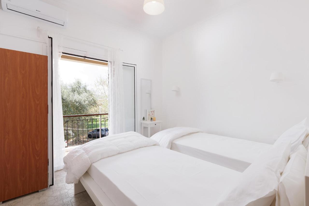 The Island Life Apartments By Konnect, Ipsos Beach Bagian luar foto